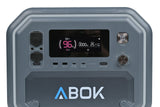 Portable 2500W LiFePO4 current station model ABOK ARK2500 with digital display showing power and battery status.