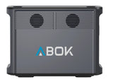 Portable 2000W LiFePO4 current station ABOK Ark2000, compact power source with digital display and sturdy design.